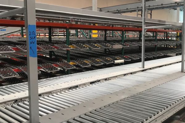 Gravity Conveyor integration with carton flow system